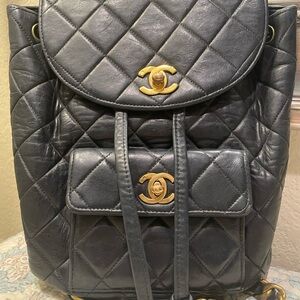 CHANEL Black Quilted leather duma Backpack with Gold Accents